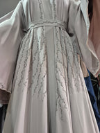The Ethereal Blush Abaya: Delicately Embellished