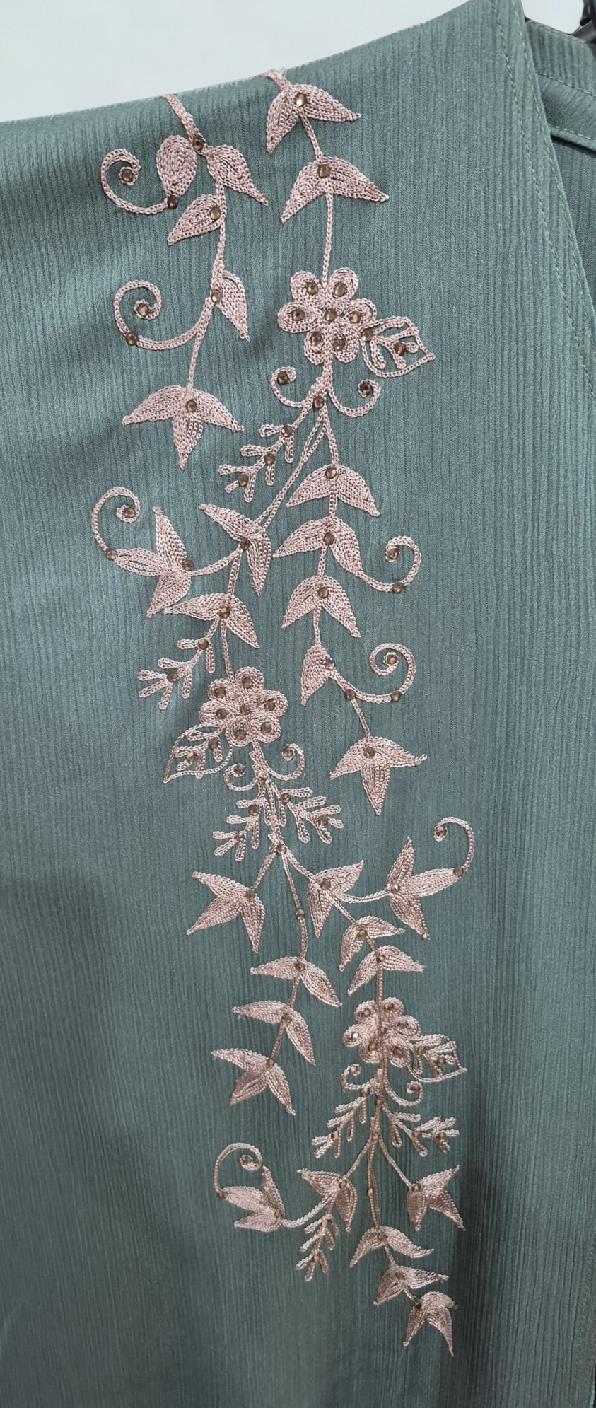 Front and sleeve embroidery green